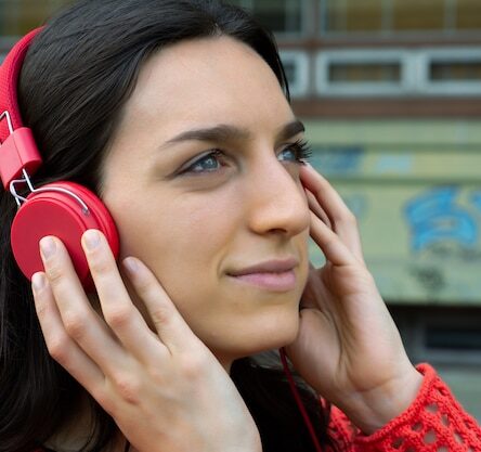 young-woman-listening-music_58466-7734